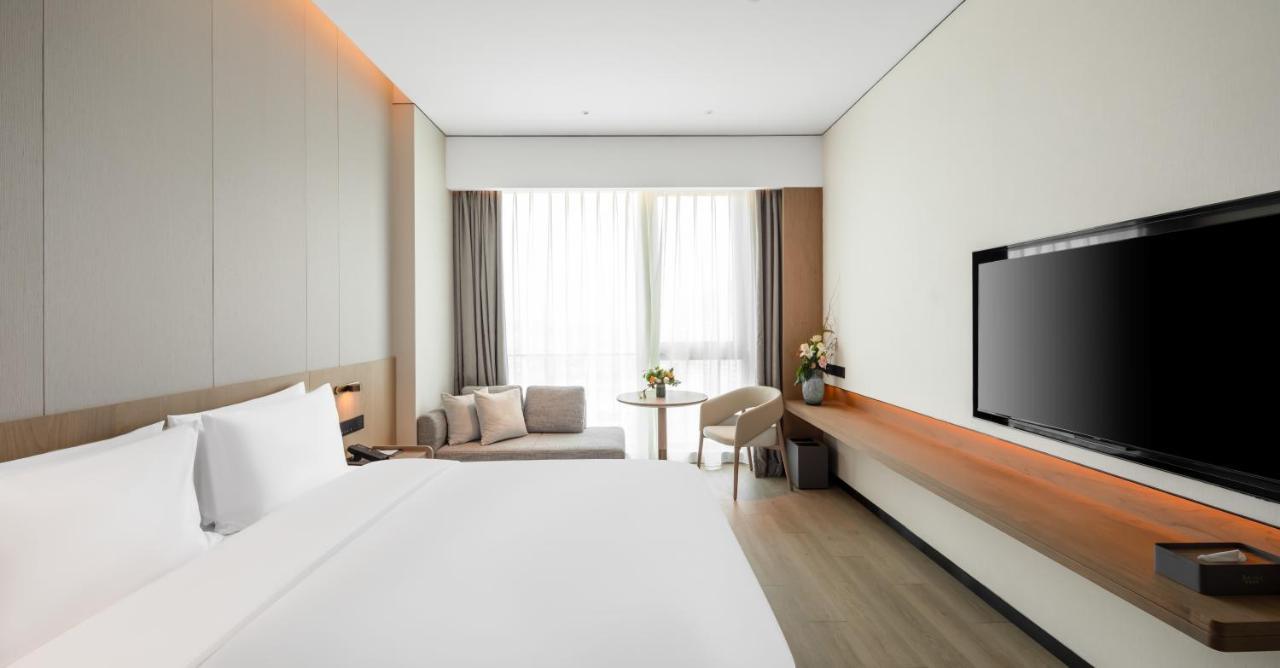 The Coli Hotel Жинан Екстериор снимка